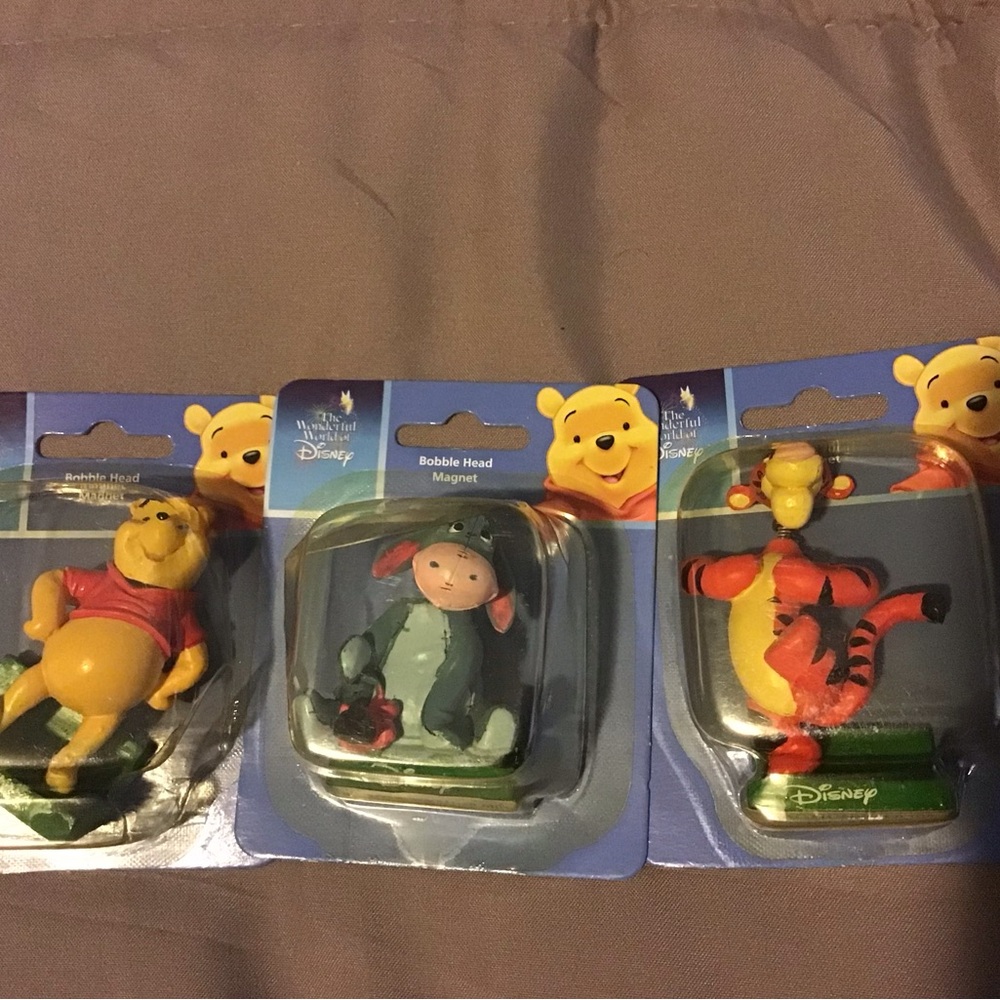 Pooh, tiger and Eeyore bobble head magnets